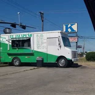  green and white food truck