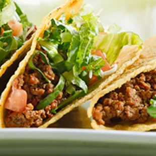 three tacos on a plate