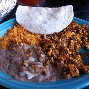 Huevos and chorizo, with beans rice and flour tortillas, GREAT!