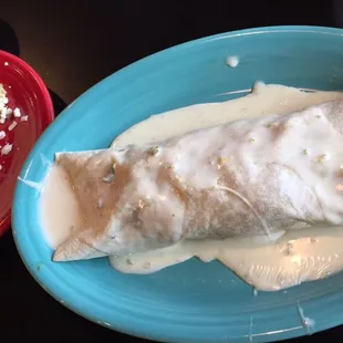 Super Burrito w/ Suizo Sauce and a 99 cent Taco! Delicious! And huge!