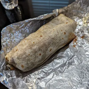 a burrito wrapped in foil
