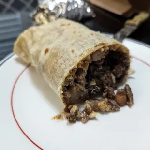 a burrito on a plate