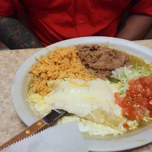Enchiladas verdes with refried beans mexican rice and a salad!