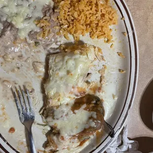 Chicken enchilada, Chile relleno with beans and rice