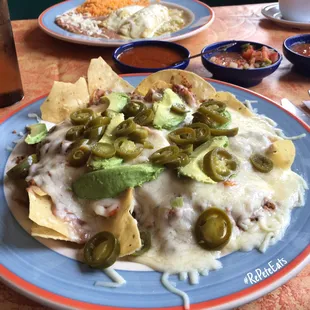 Nachos Con Carne - Lunch portion under $8. Enough for two meals. Best deal on the lunch menu.