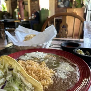 Crispy chicken taco, chili rellano with beans and rice. Yum!