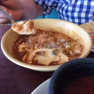 Get the chili con carne. Beef tips, roasted jalapeños, flavorful sauce, all on a bed of ref tied beans. It's good!