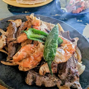 Steak, Shrimp and Chicken Fajitas