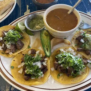 Street tacos with order of beans. Very well plated