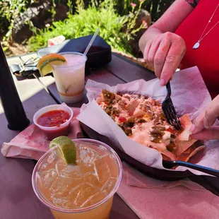 Chicken nachos w green chile and margaritas