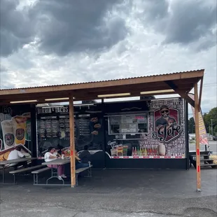 a woman sitting at a table