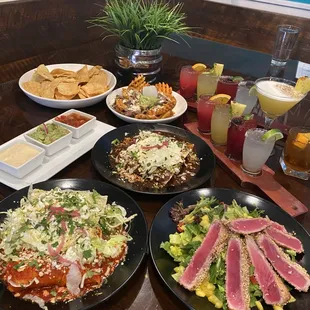 Ahi Tuna Salad, red &amp; green &amp; mole enchiladas, margarita flight, loaded waffle fries, chips and salsa