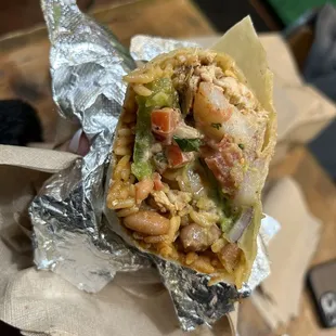 a burrito wrapped in foil