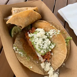 Pollo tacos with queso fresco and guacamole