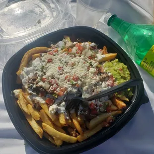 Carne Asada fries. Shareable with 2 or 3 people. Its salty.