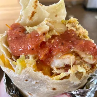 Bacon, potato, and egg burrito plus salsa