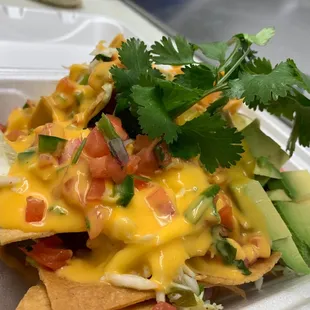 nachos in a styrofoam container