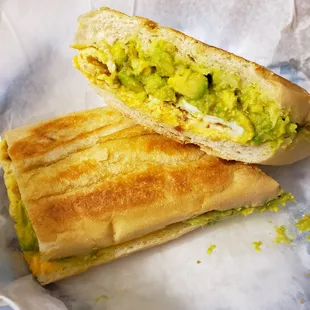Bacon egg and cheese avocado on Cuban bread