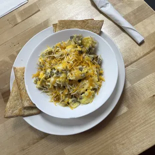 Breakfast Build Your Own Bowl w/ eggs, sausage, potatoes and cheese