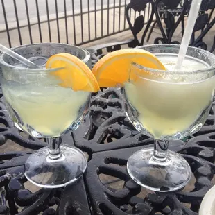 Both frozen and on-the-rocks margaritas are served with an orange instead of a lime. It&apos;s a nice touch.