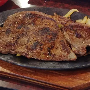 Sirloin steak, with accompanying sides (minus rice, and I gave the guac salad to my niece).