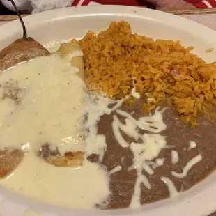 Chile relleno, cheese enchilada, rice and beans