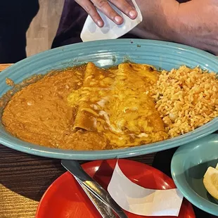 2 enchiladas with flavorless rice and beans (she said)