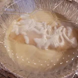 Cheese enchilada with special request sour cream sauce.