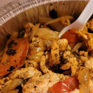 Burnt bits from the grill all throughout my chicken fajitas.