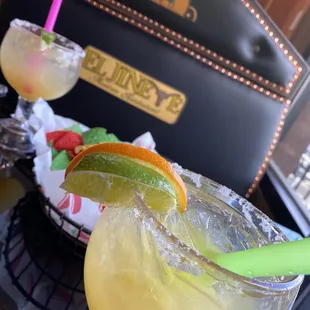 a margarita with a lime garnish