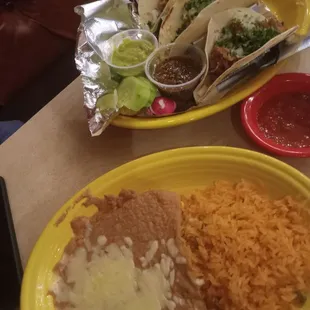 Carnitas taco plate comes with rice &amp; beans