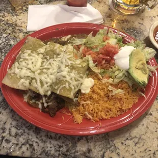El Jenete Enchiladas (steak).  tortillas were "tucked in" to look like they're rolled, had to scoop contents. Total mess