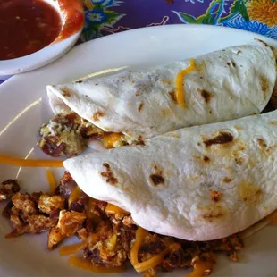 Breakfast burritos w chorizo, bacon, egg, beans, and cheese. Awesome!