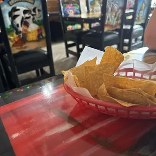 Inside a combination of tables and colorful tables