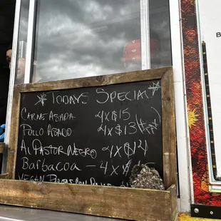 a menu on a blackboard