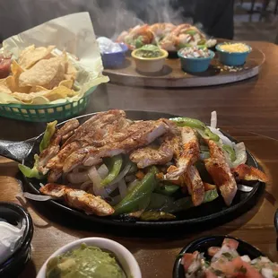 Foregrounds Chicken Fajitas &amp; shrimp fajitas in the back!
