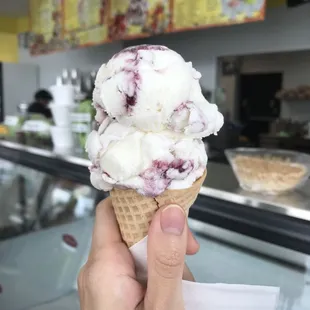 Cream and Raspberry Ice cream (small cone)