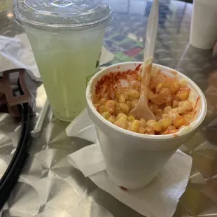 a bowl of food and a drink