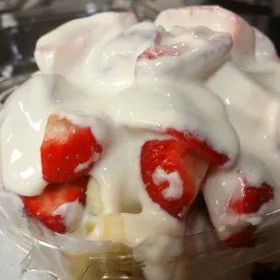 Strawberries and bananas with cream