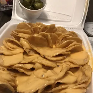 Large nachos to go w/side jalapeños