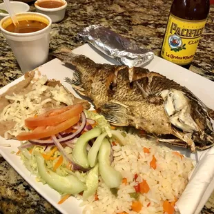 Mojarra frita with rice and beans