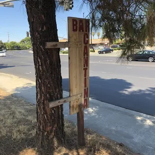  wooden sign on a tree