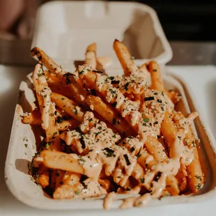 Furikake Fries topped with sriracha mayo