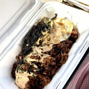 a meal in a styrofoam container