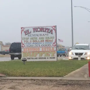 a sign advertising a restaurant