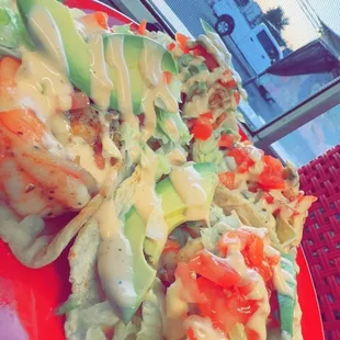 Shrimp taco's  Homemade tortilla  Sauté shrimp  Lettuce  Tomato  Avocado  Our special house dressing