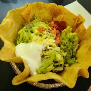 Classic Taco Salad with shredded chicken -- def needed more shredded lettuce and cheese.