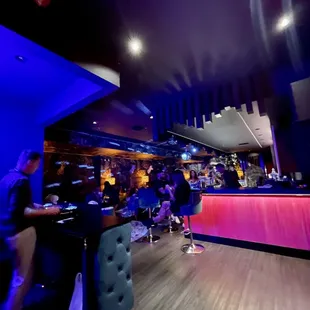 people sitting at the bar