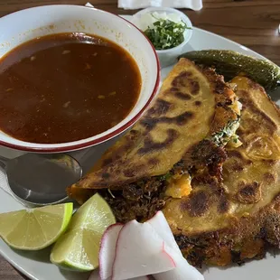 Birria borrego tacos with consume.