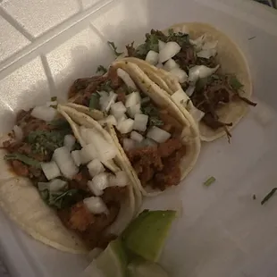 Tacos Al pastor (middle and left)